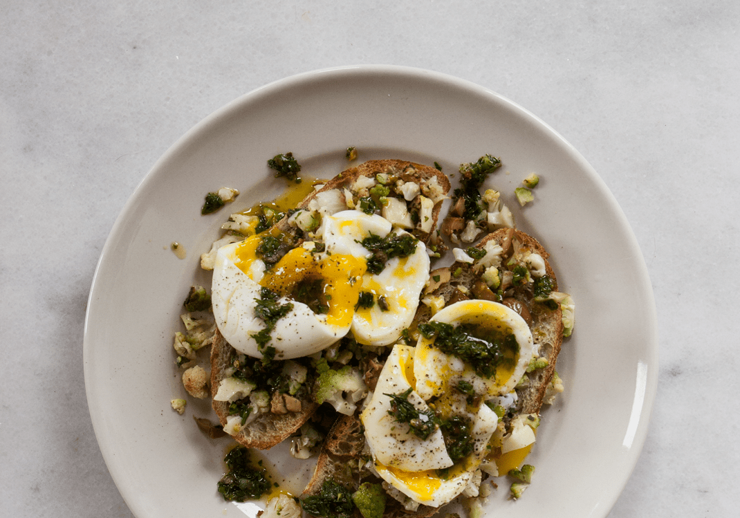 Soft Boiled Eggs and Seared Cauliflower with Salsa Verde and Olives on Sourdough Toast
